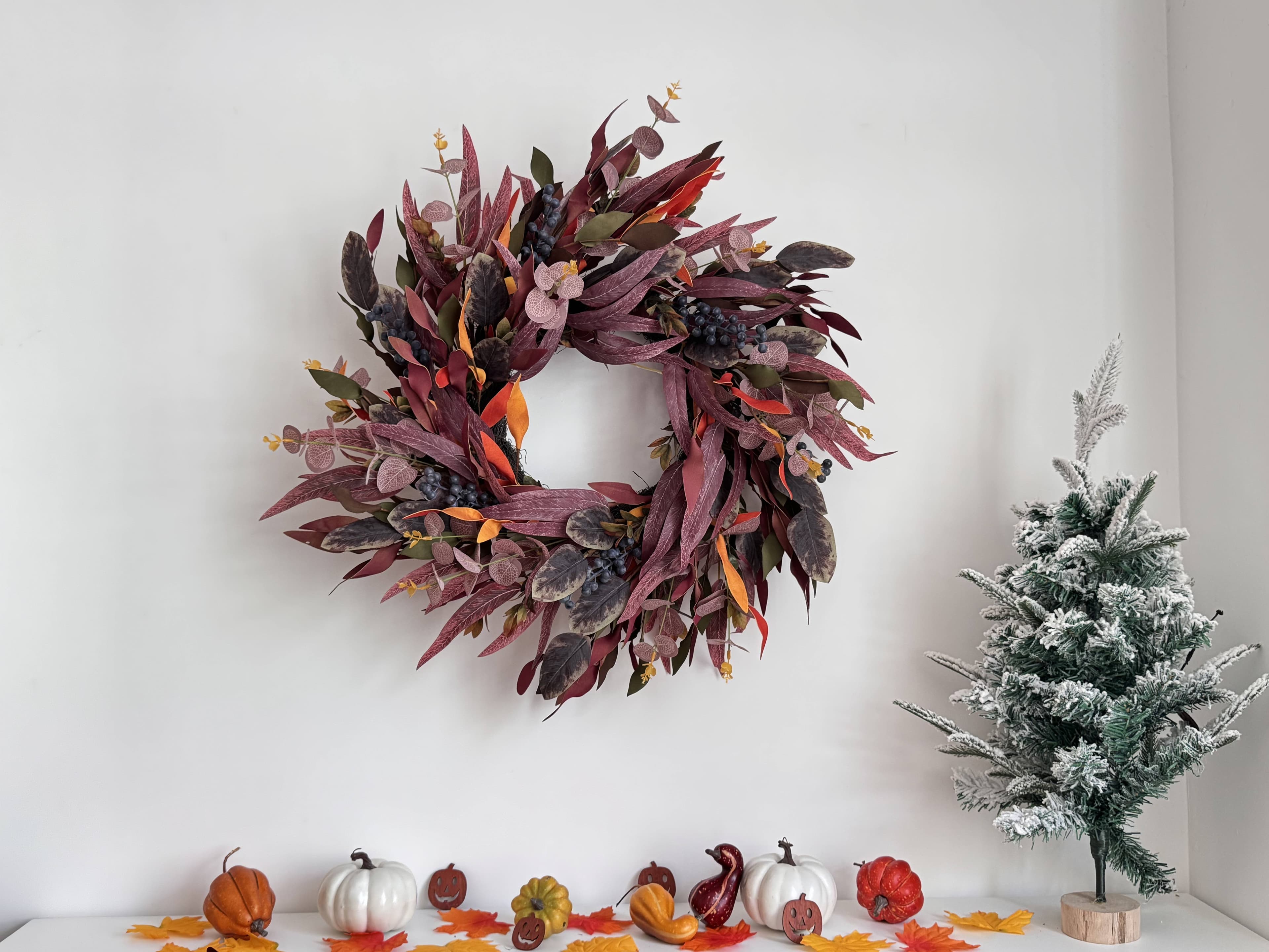 The Ember Grove autumn wreath with deep berries and layered foliage